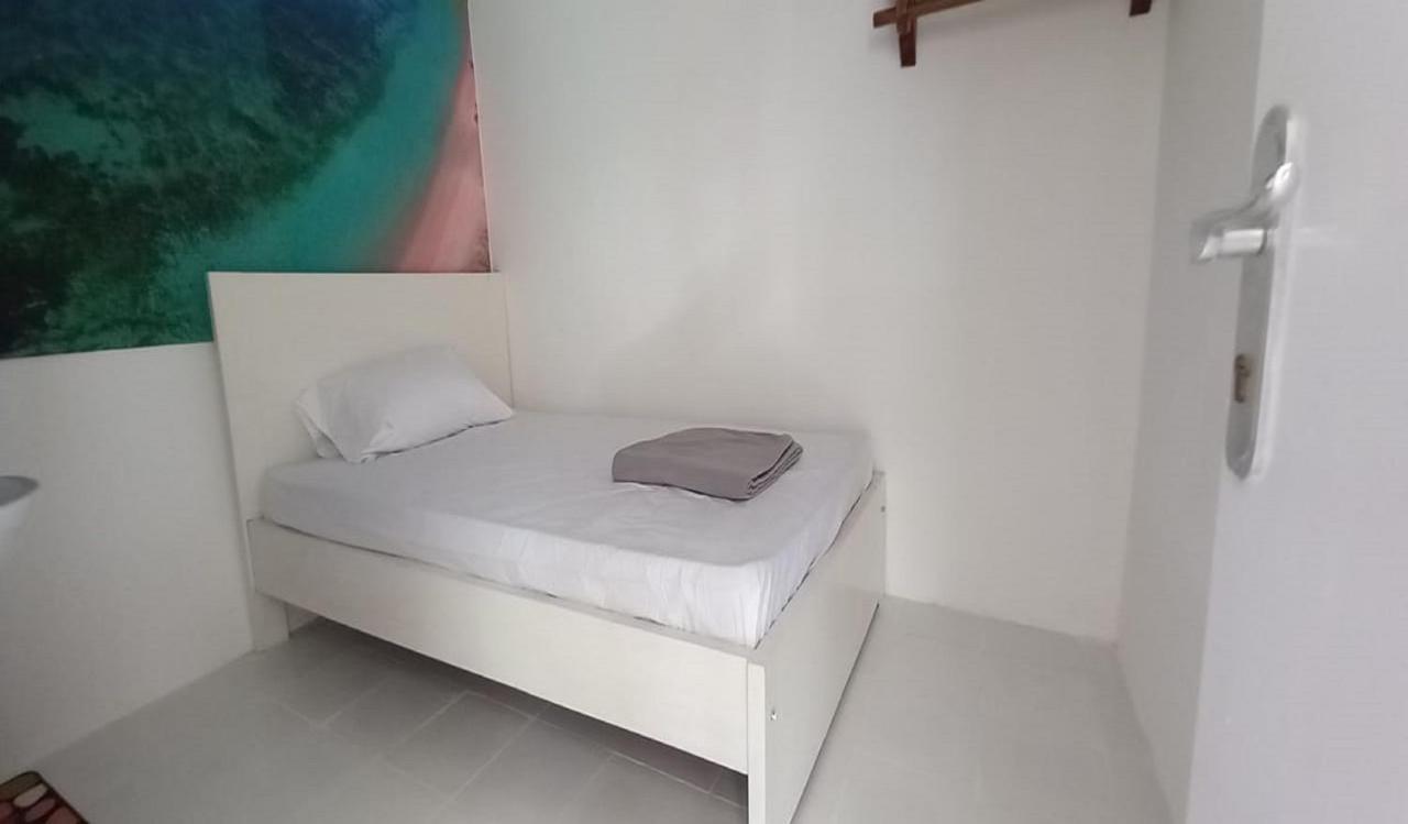 Oyo 90974 Homestay Golo Koe Sejahtera Labuan Bajo Luaran gambar